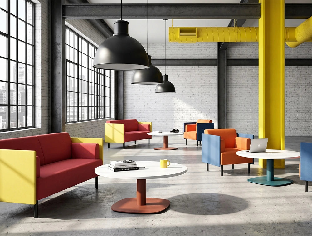 WsD Nexis Plus Cylinder Squircle Base Coffee Table with Round Table Top with Snug Soft Seating in Modern Breakout Setting