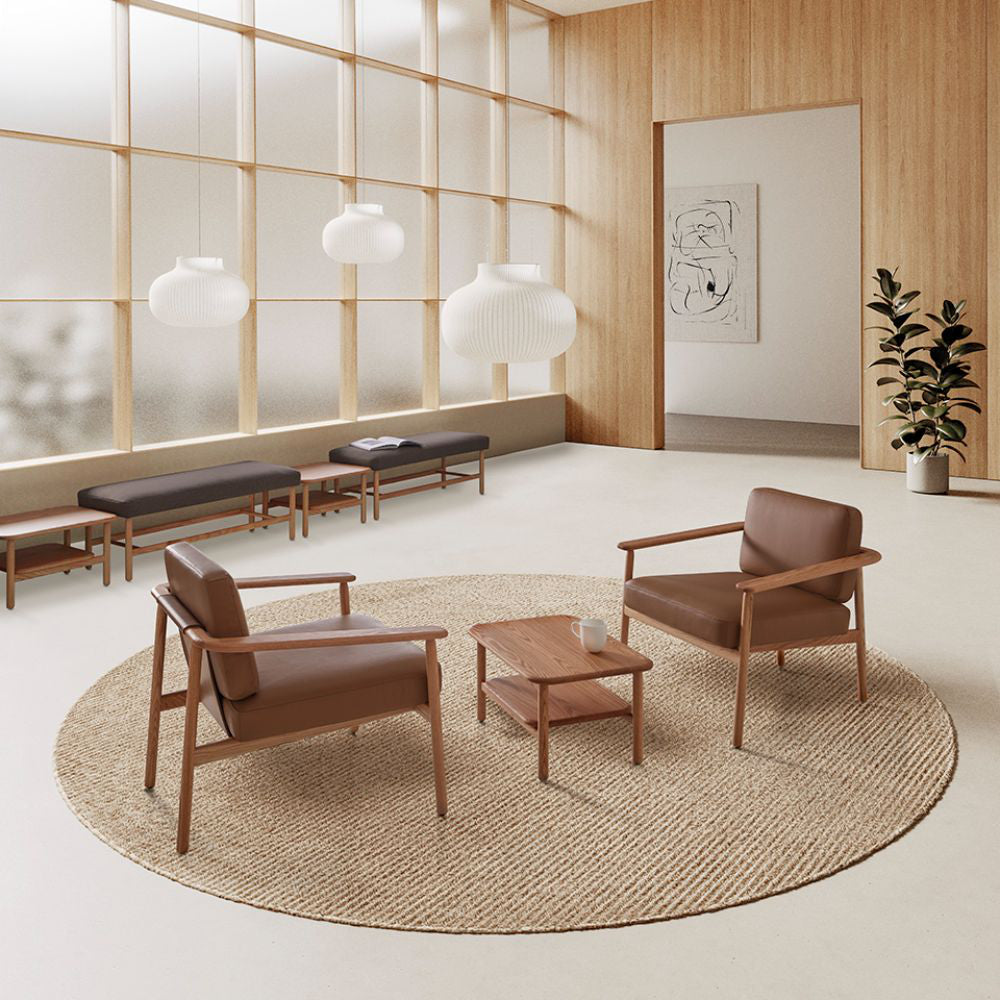 Wudi Upholstered Lounge Armchair With Coffee Table And Floor Rug In Reception Setting
