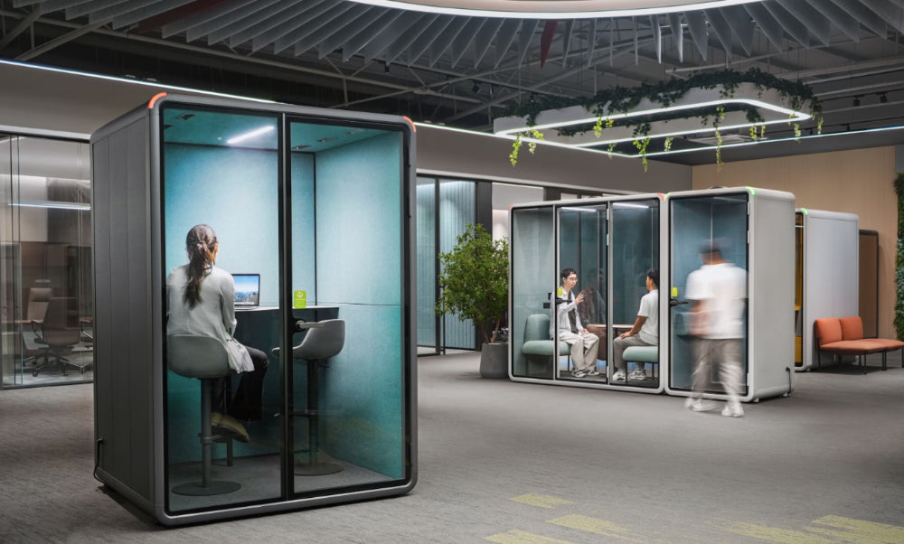 Zum Meeting Pod in Grey Finish with Phonebooths and Modular Sofa in Breakout Setting